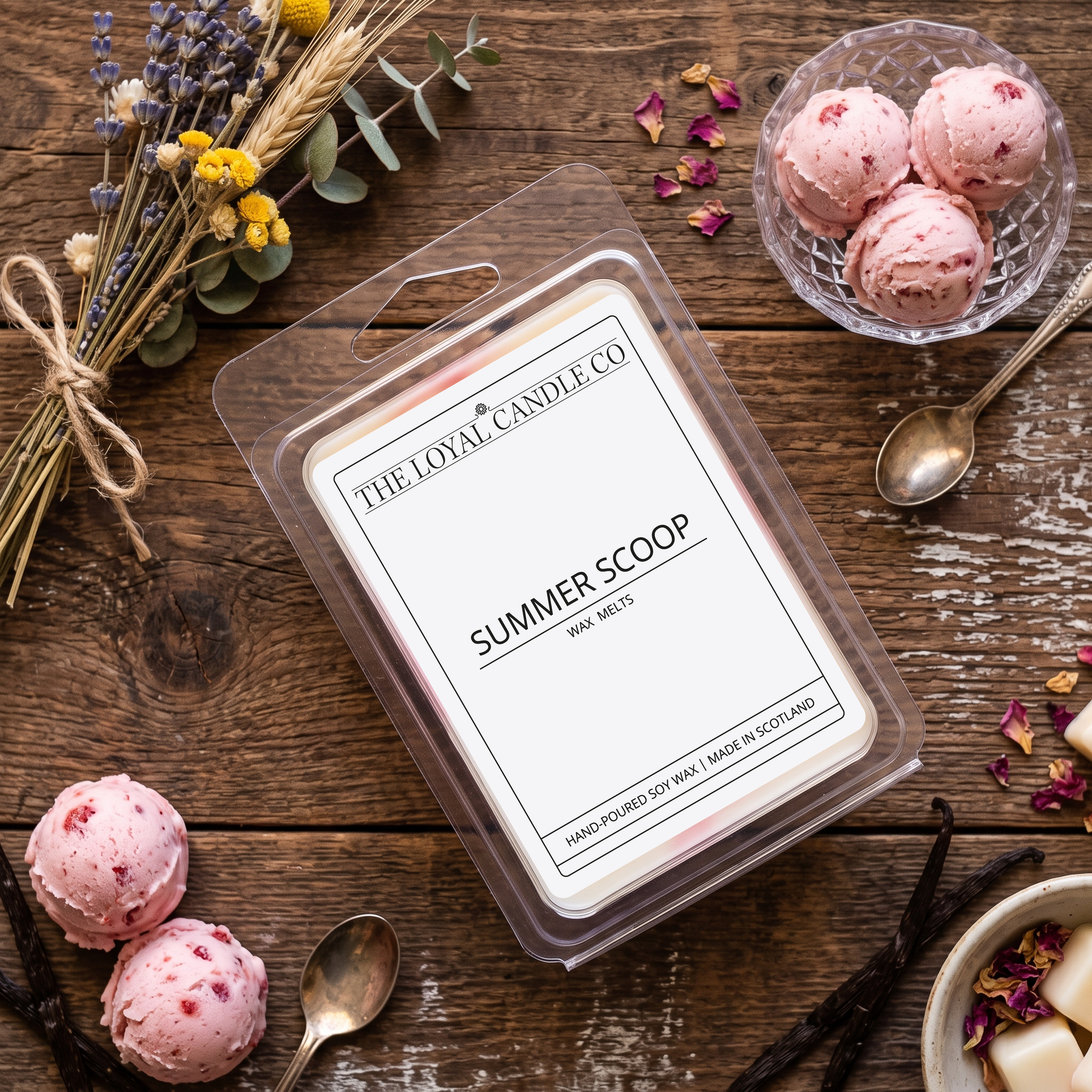 Summer Scoop wax melt clamshell with fresh strawberries on a dark wood background.